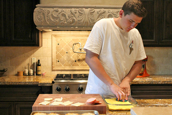 Easy to Make Ahead Freezer Breakfast Sandwiches - a super quick solution for eating a quick breakfast or grab and go on busy mornings! Recipe from RecipeBoy.com