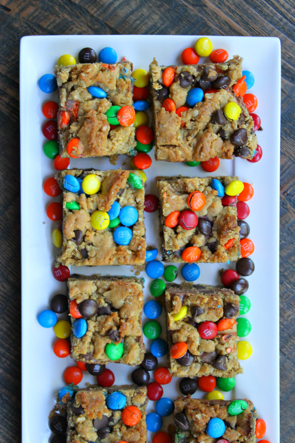 Monster Cookie Chocolate Cheesecake Bars - Recipe Boy