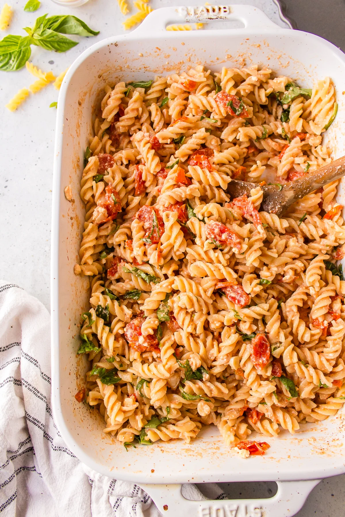 tik tok baked feta pasta in white casserole dish