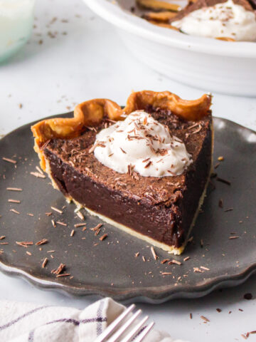 slice of chocolate chess pie on a plate