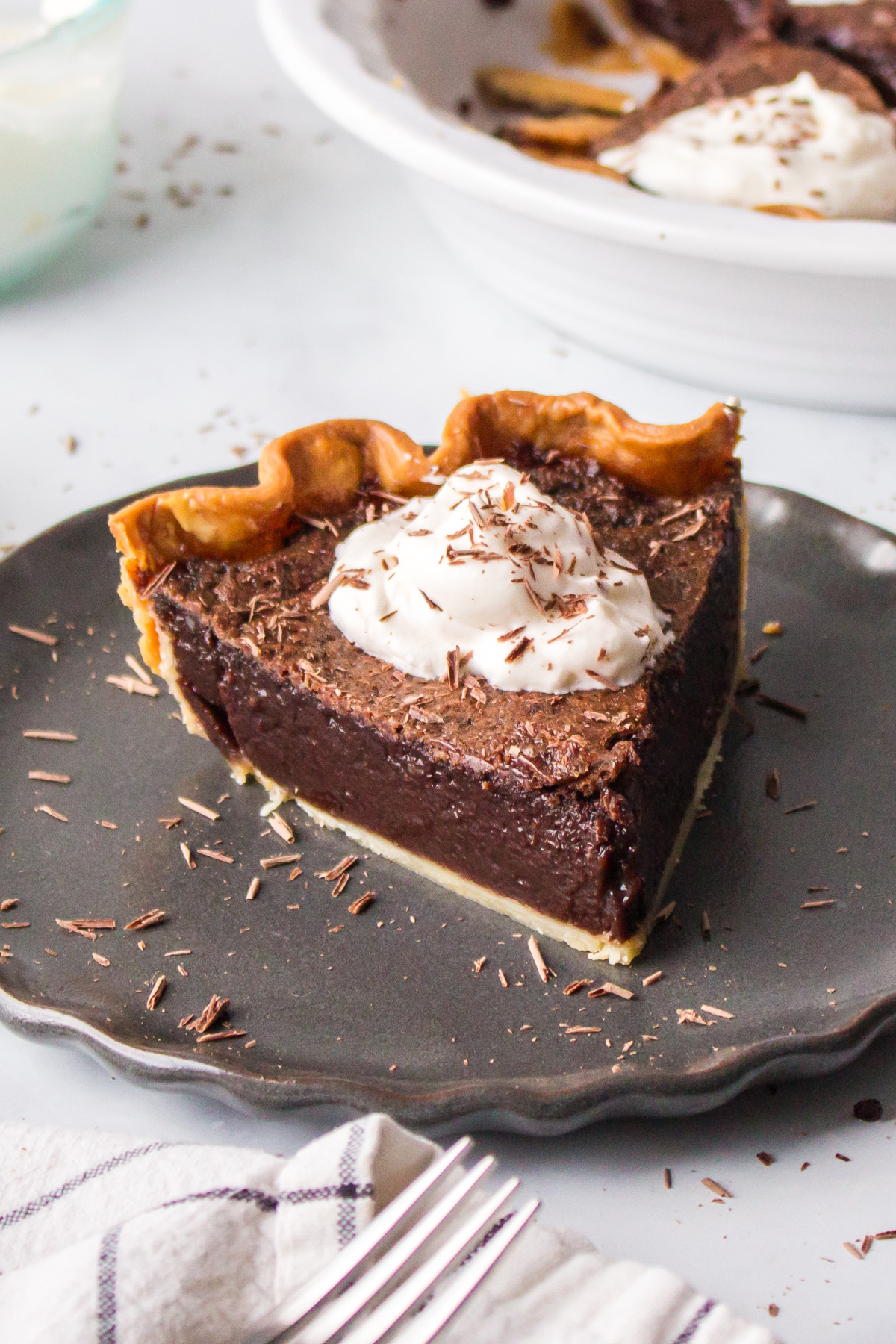 slice of chocolate chess pie on a plate