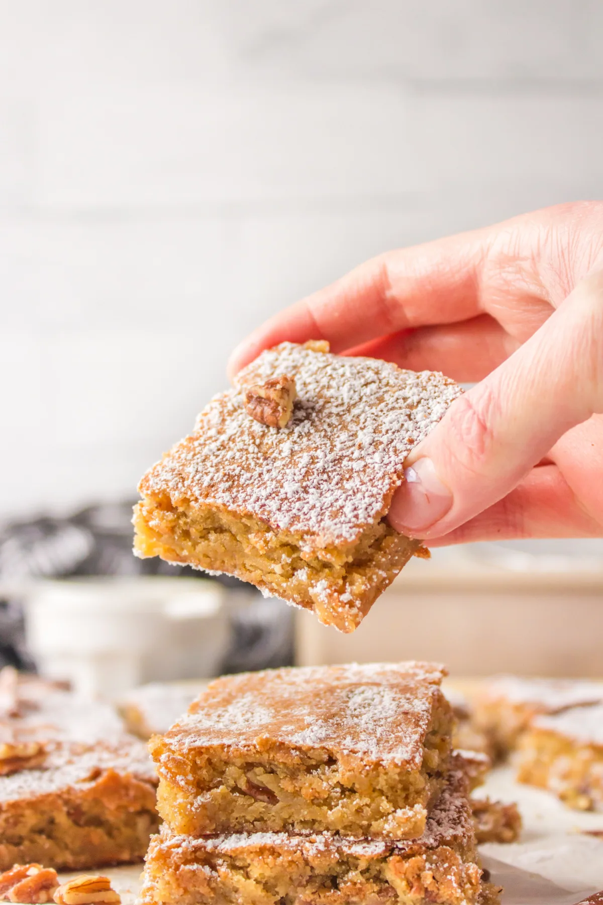 hand holding maple butterscotch blondie