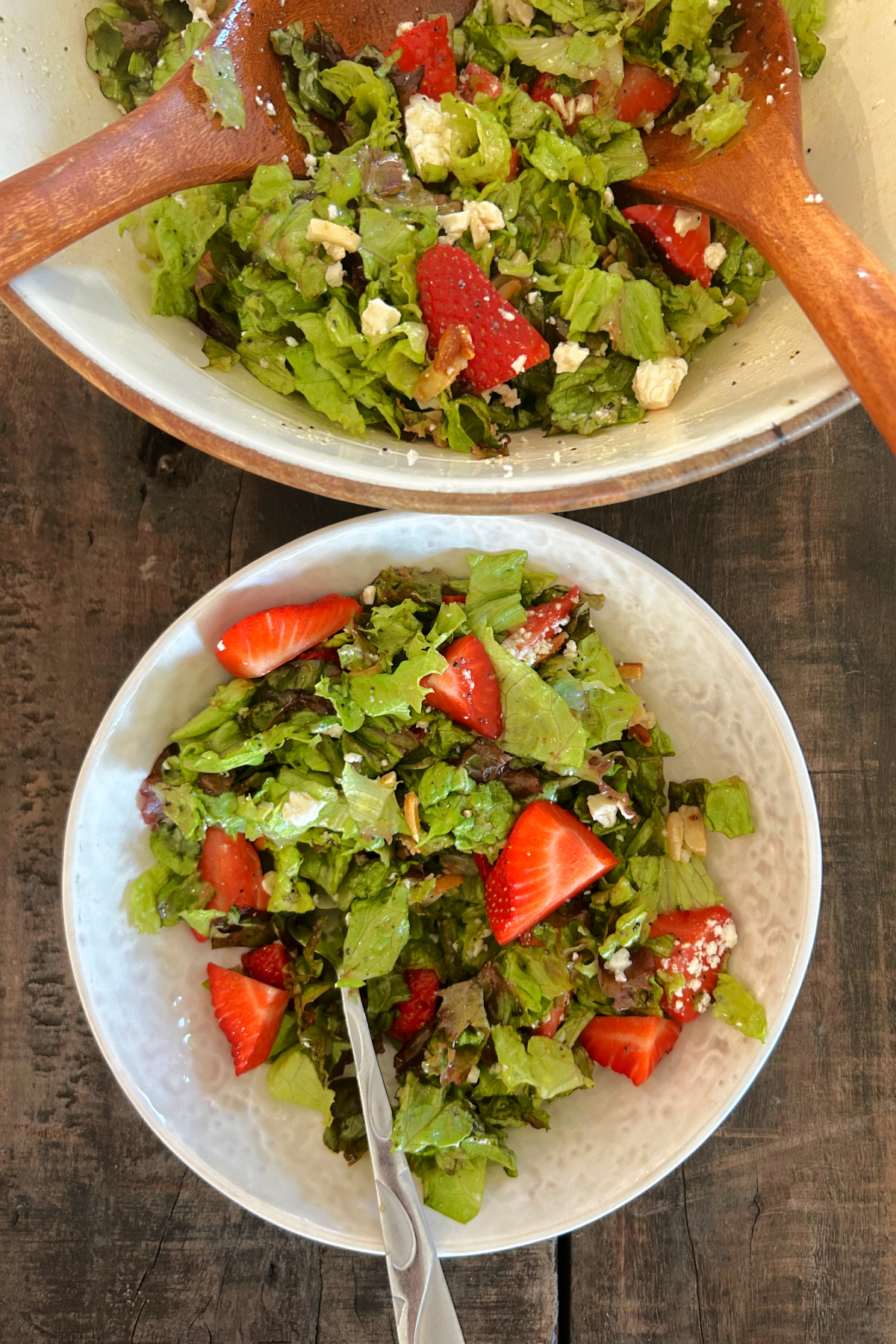 strawberry almond salad in bowl and one serving in bowl