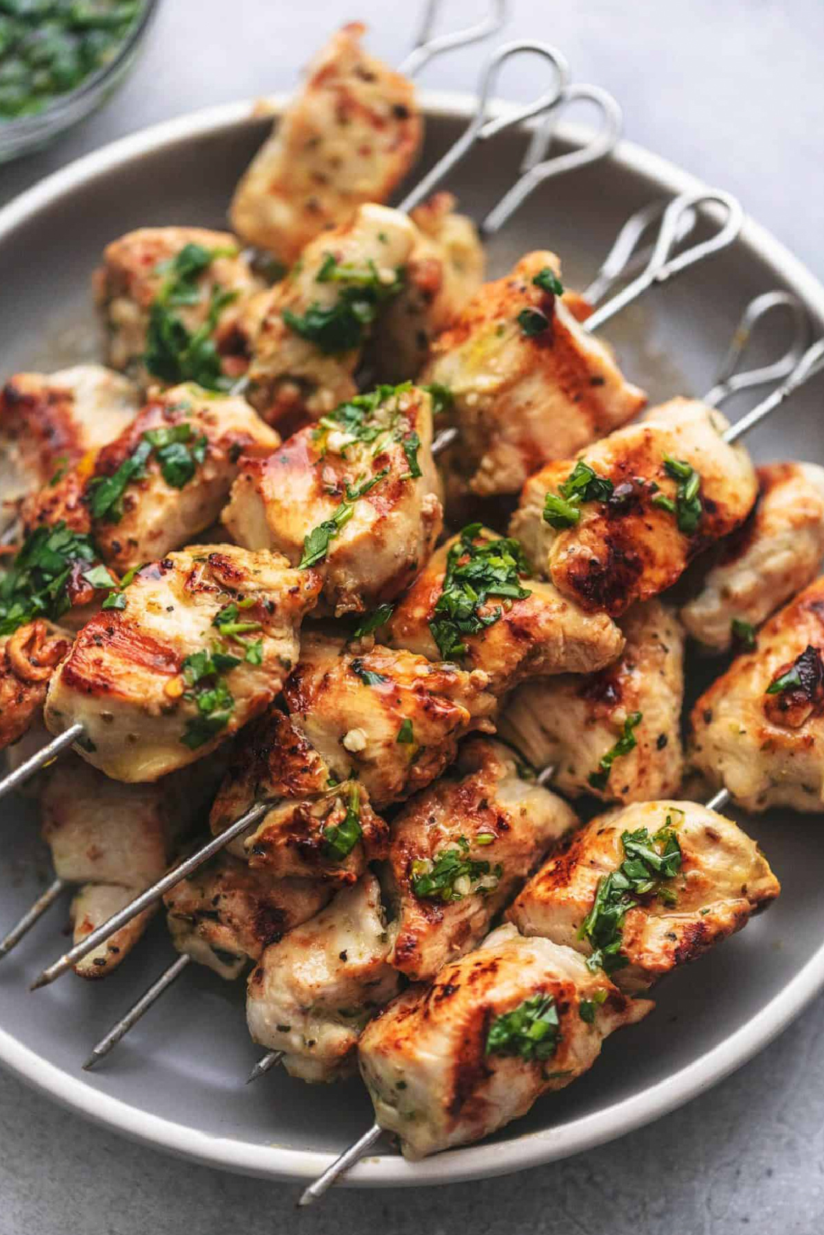 argentinian chimichurri chicken kebabs on a plate