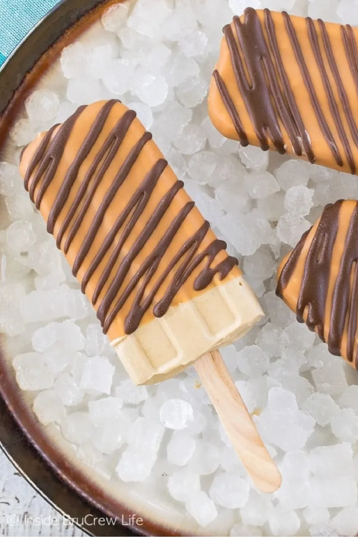 caramel frappuccino pudding pops in bowl of ice