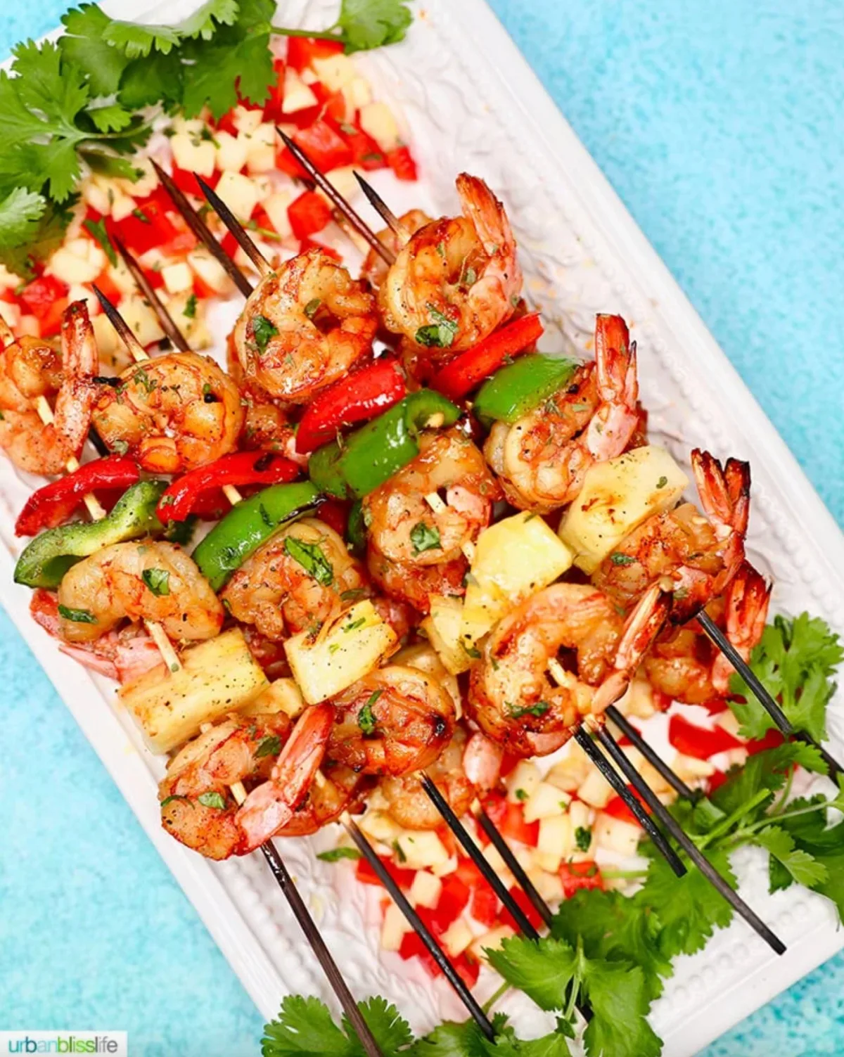 grilled shrimp and pineapple kebabs on platter