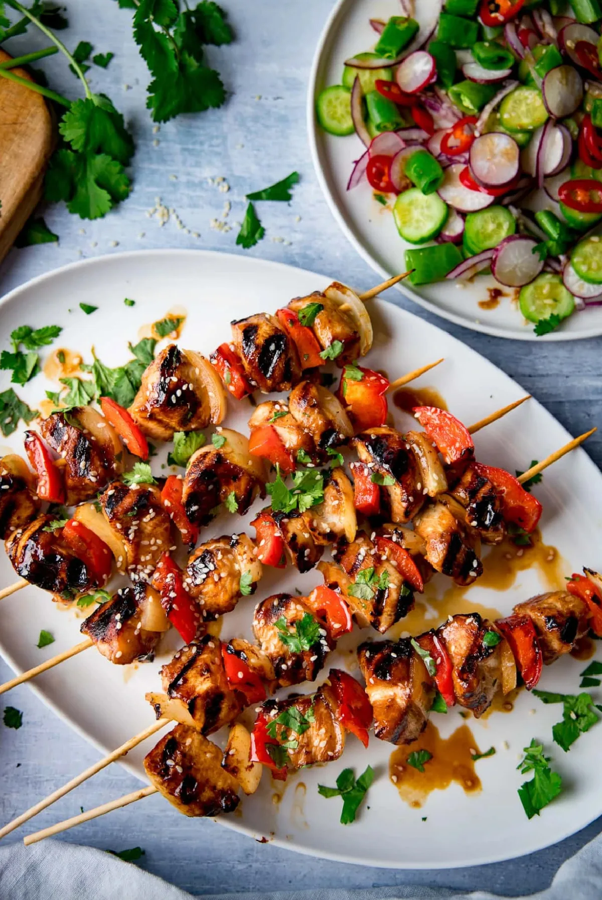 honey garlic chicken skewers on platter