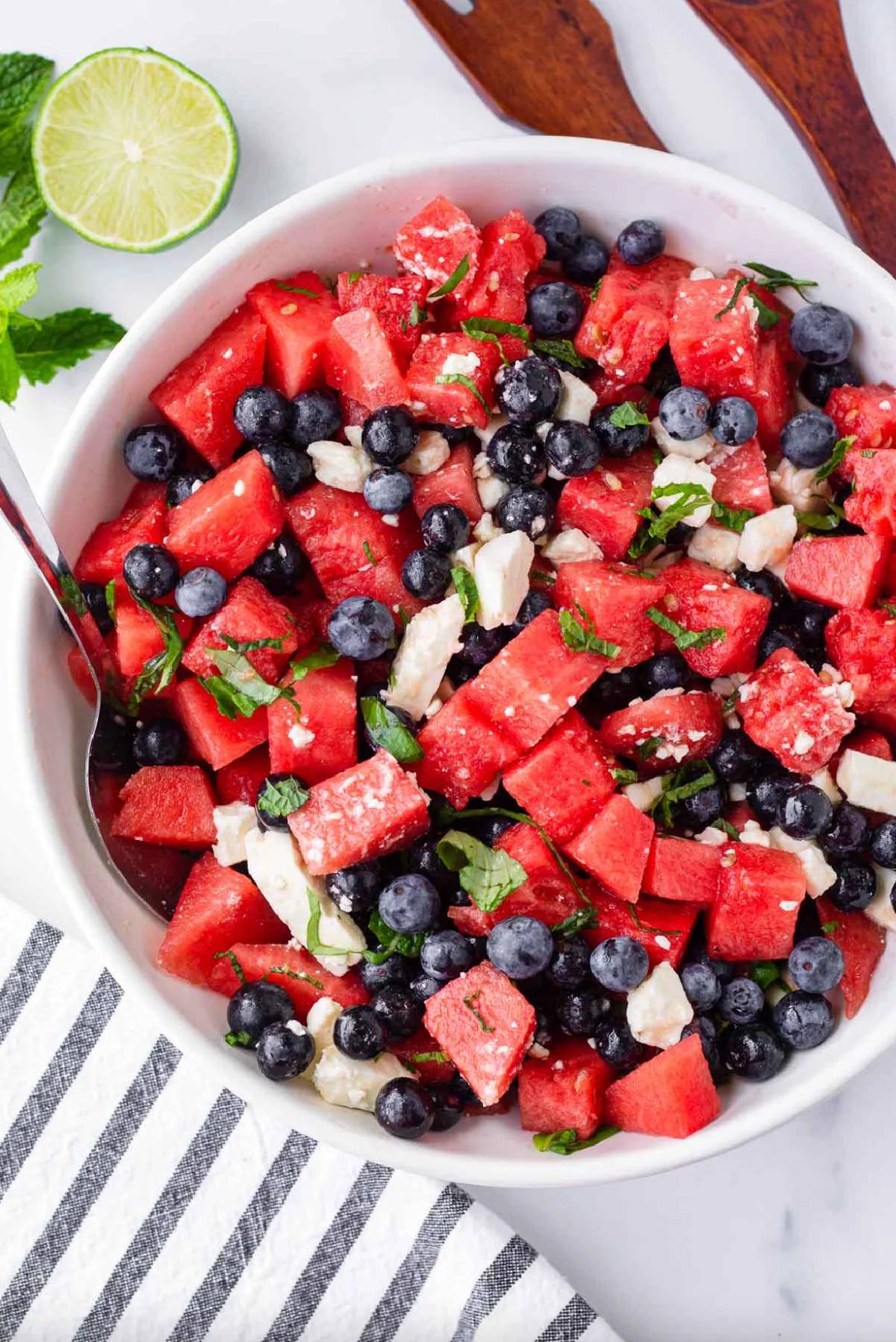 watermelon feta salad with blueberries in bowl