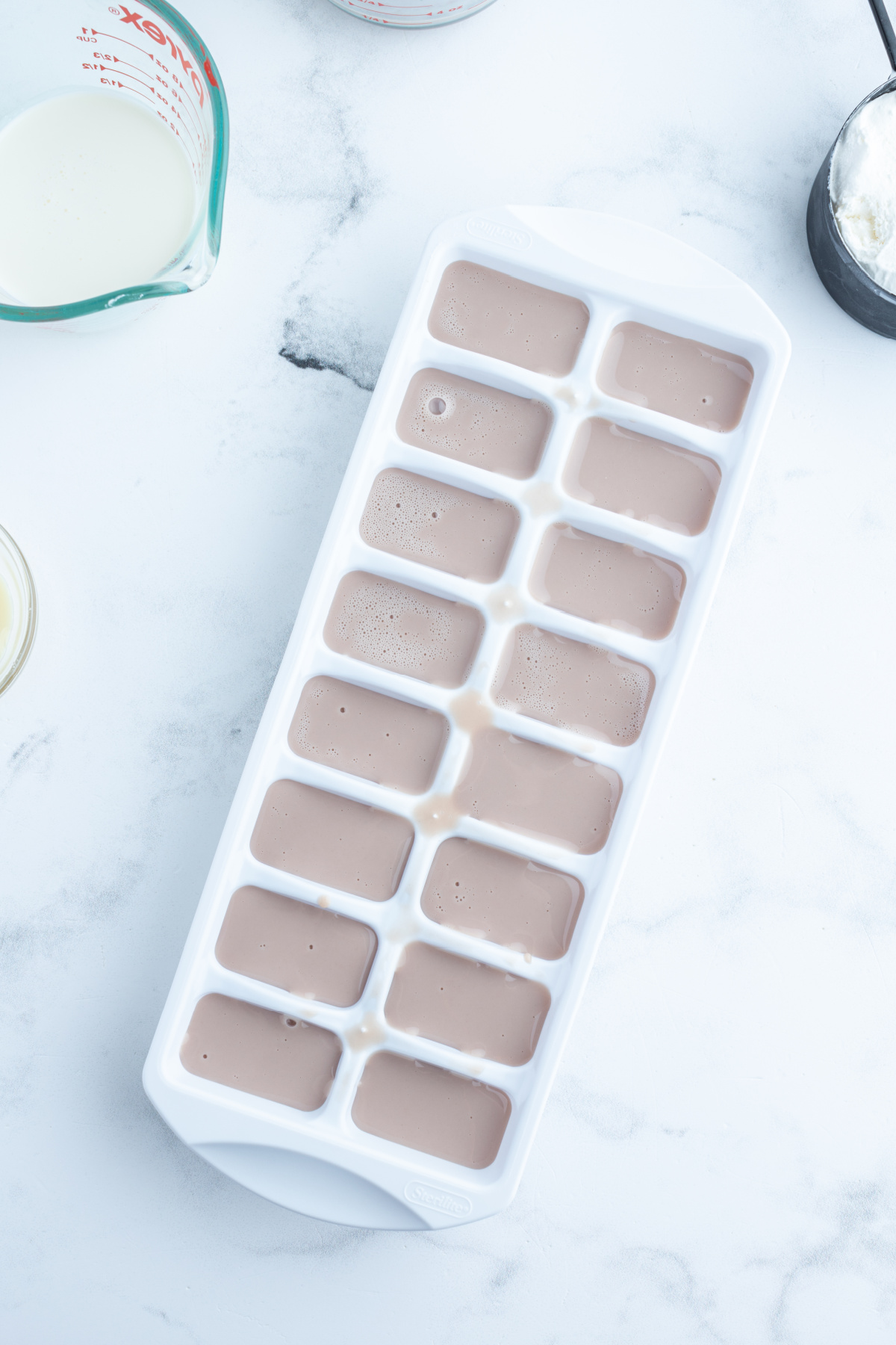 ice cube tray of chocolate milk