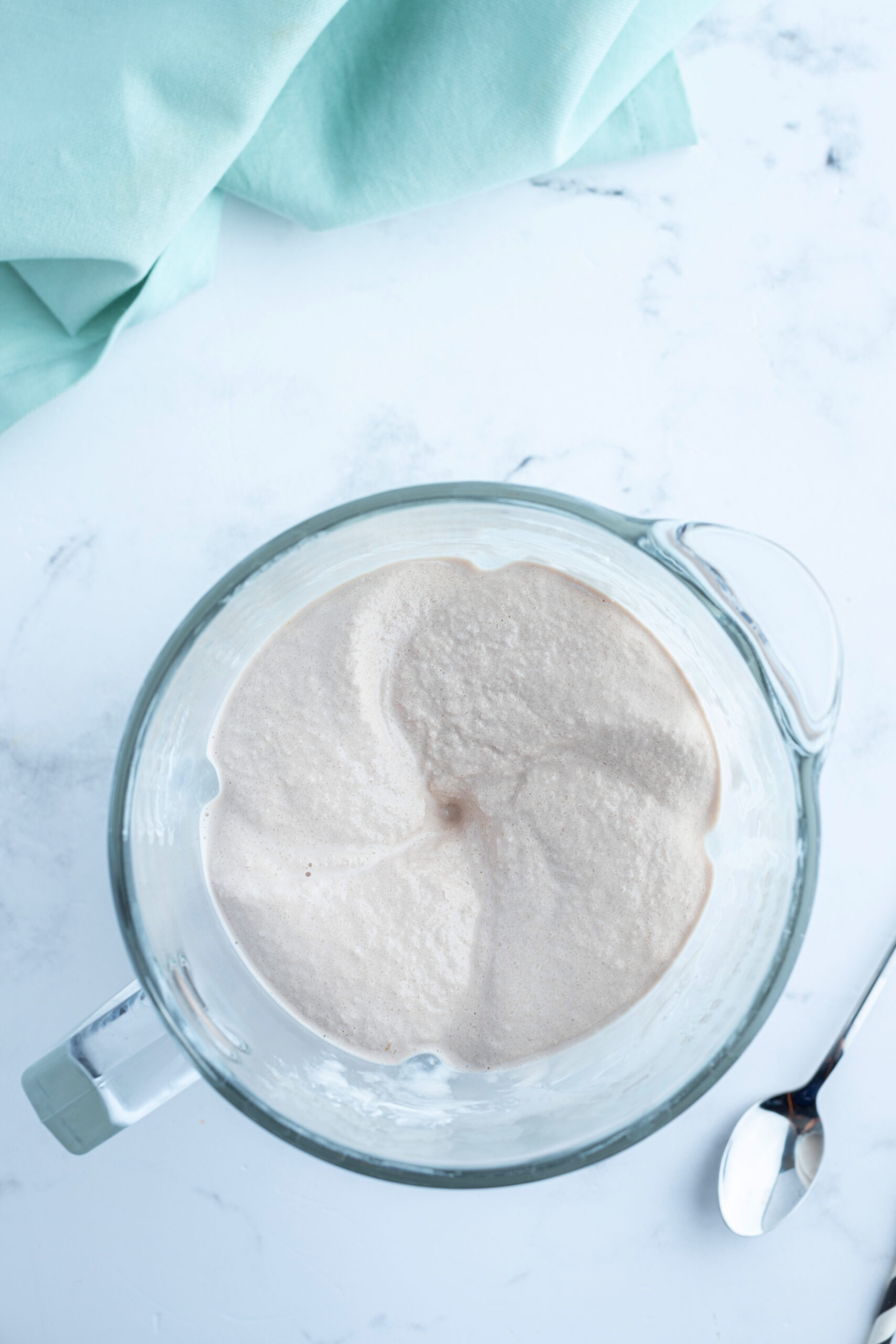 overhead shot of blender of chocolate frosty