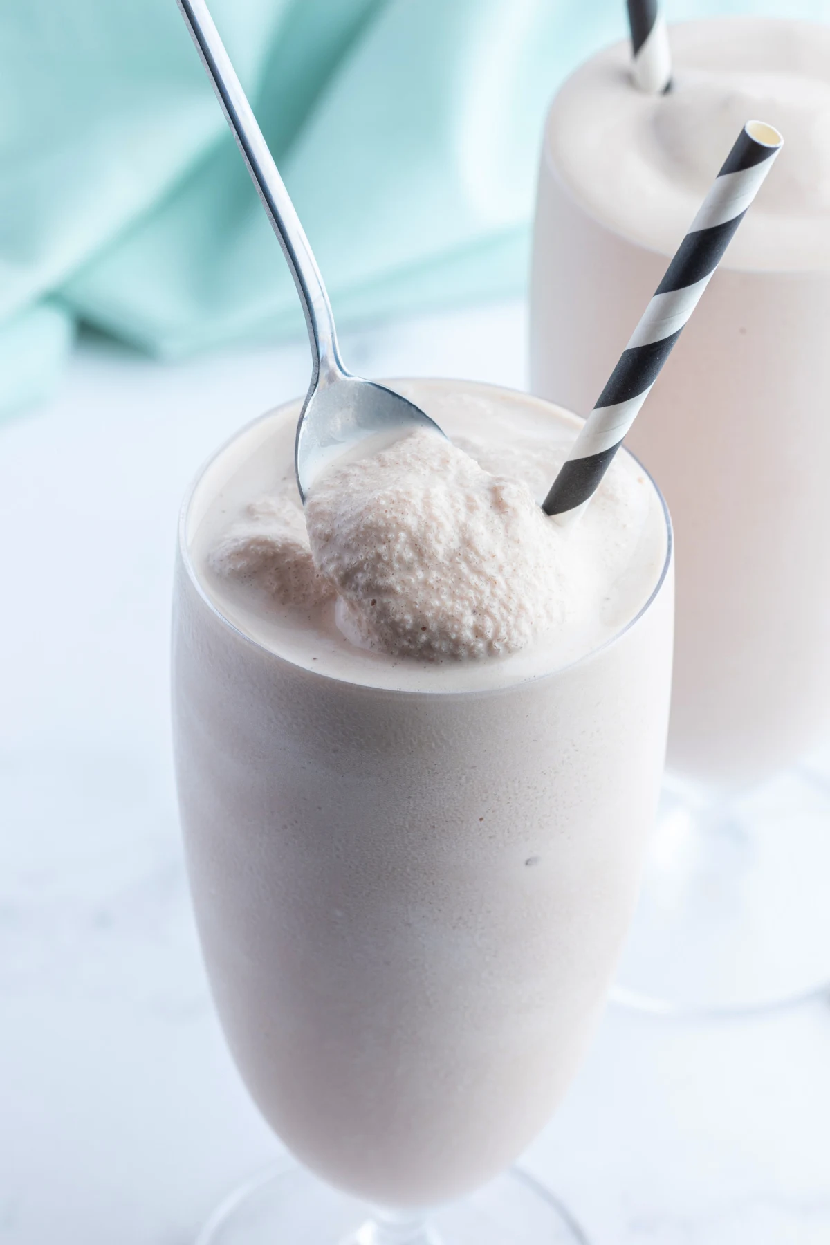 spoon in a glass of copycat wendy's chocolate frosty