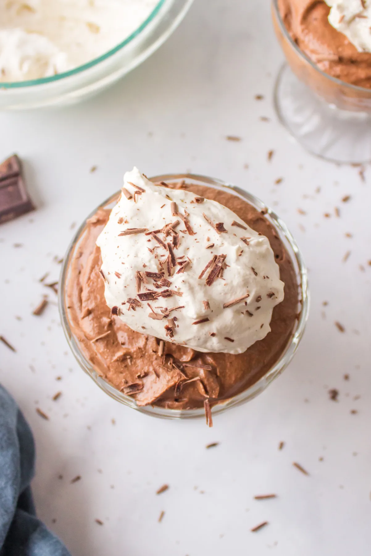 overhead shot of chocolate mousse with whipped cream