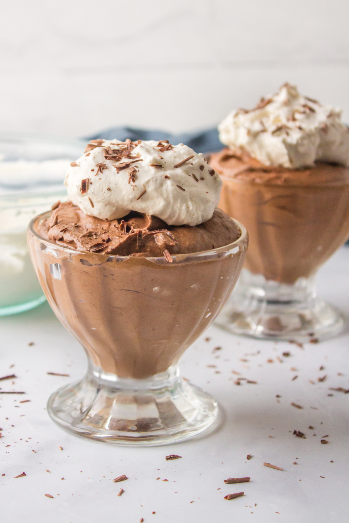 cups of chocolate mousse with whipped cream