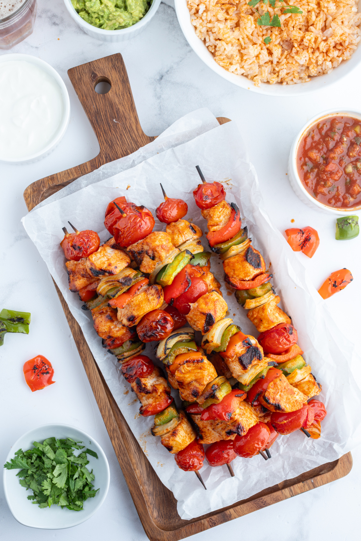 grilled chicken taco kebabs on a rectangular platter