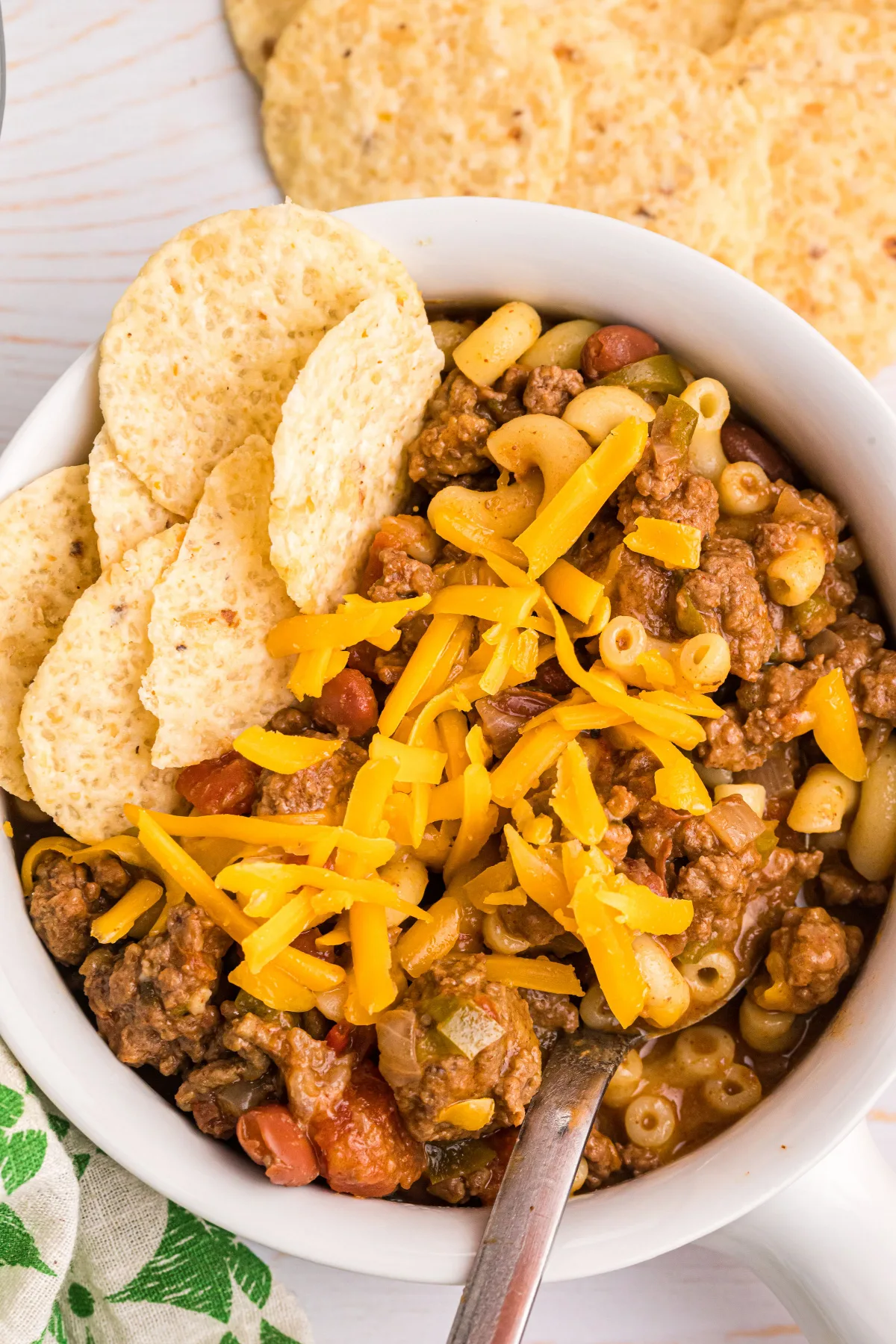 bowl of beef chili mac with tortilla chips