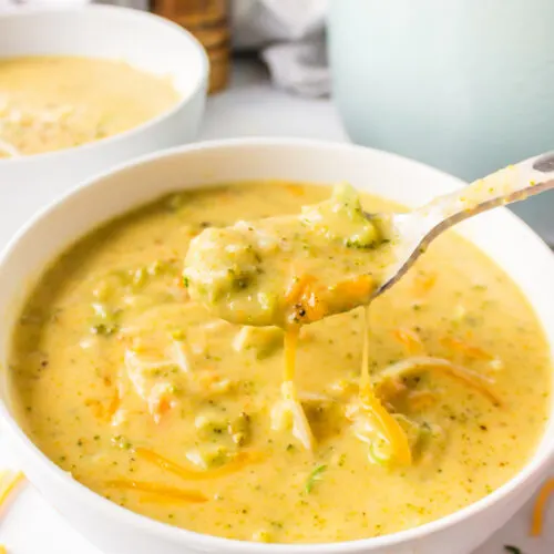 bowl of broccoli cheese soup with spoon