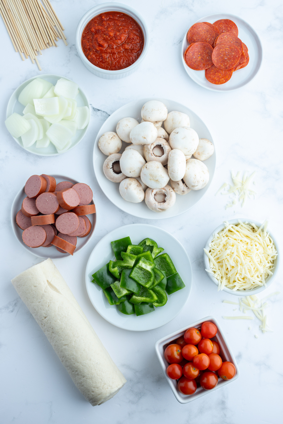 ingredients displayed for making pizza kabobs