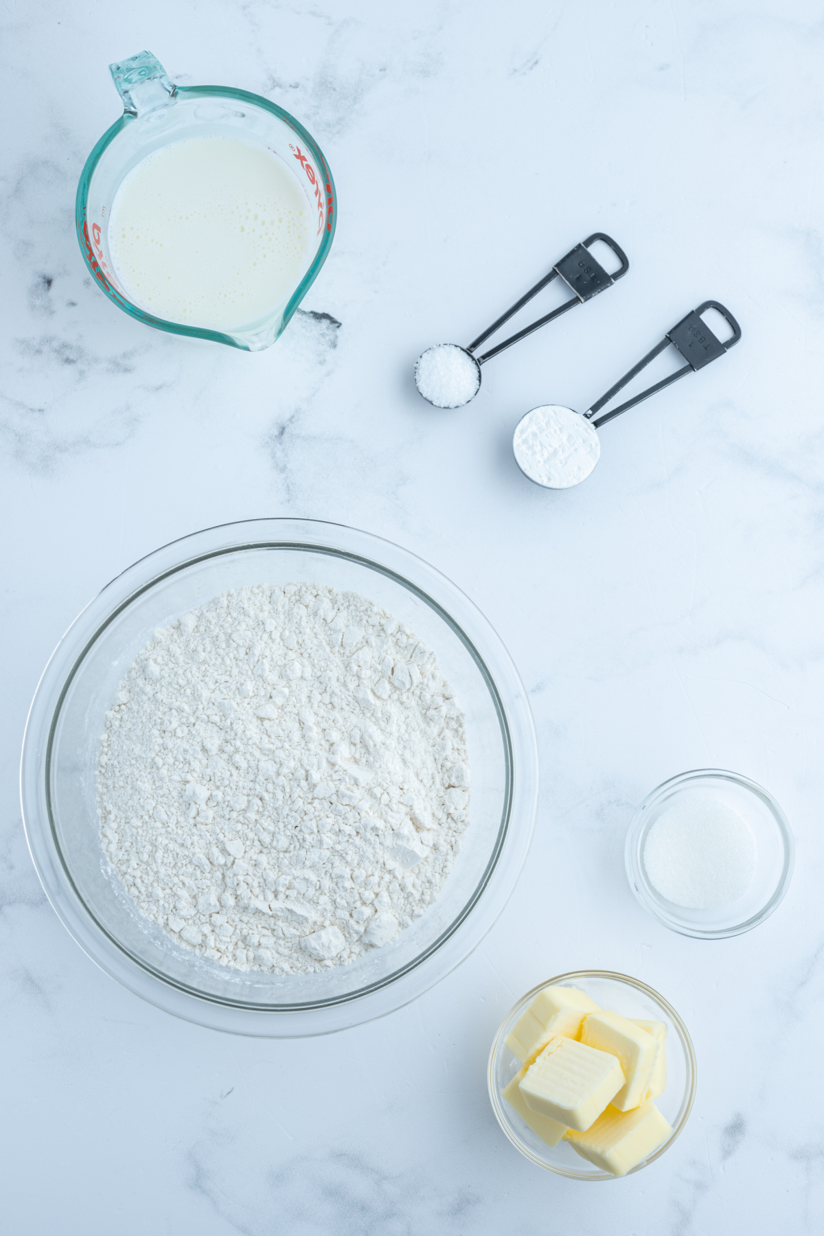 ingredients displayed for making baking powder biscuits