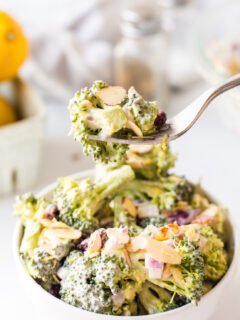 Fork full of broccoli crunch salad